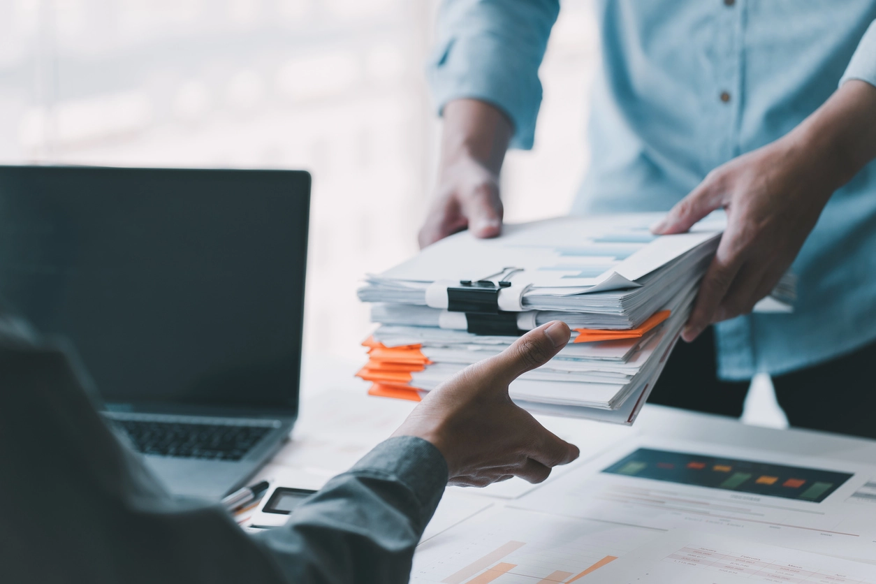 stack of product information forms