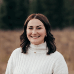 A woman smiling for the camera