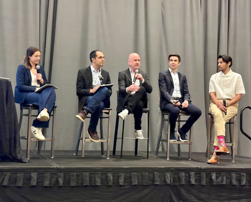 SPC Impact speaker panel, a group of people sitting on chairs
