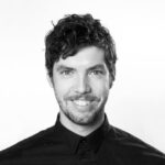 A man smiling for a picture