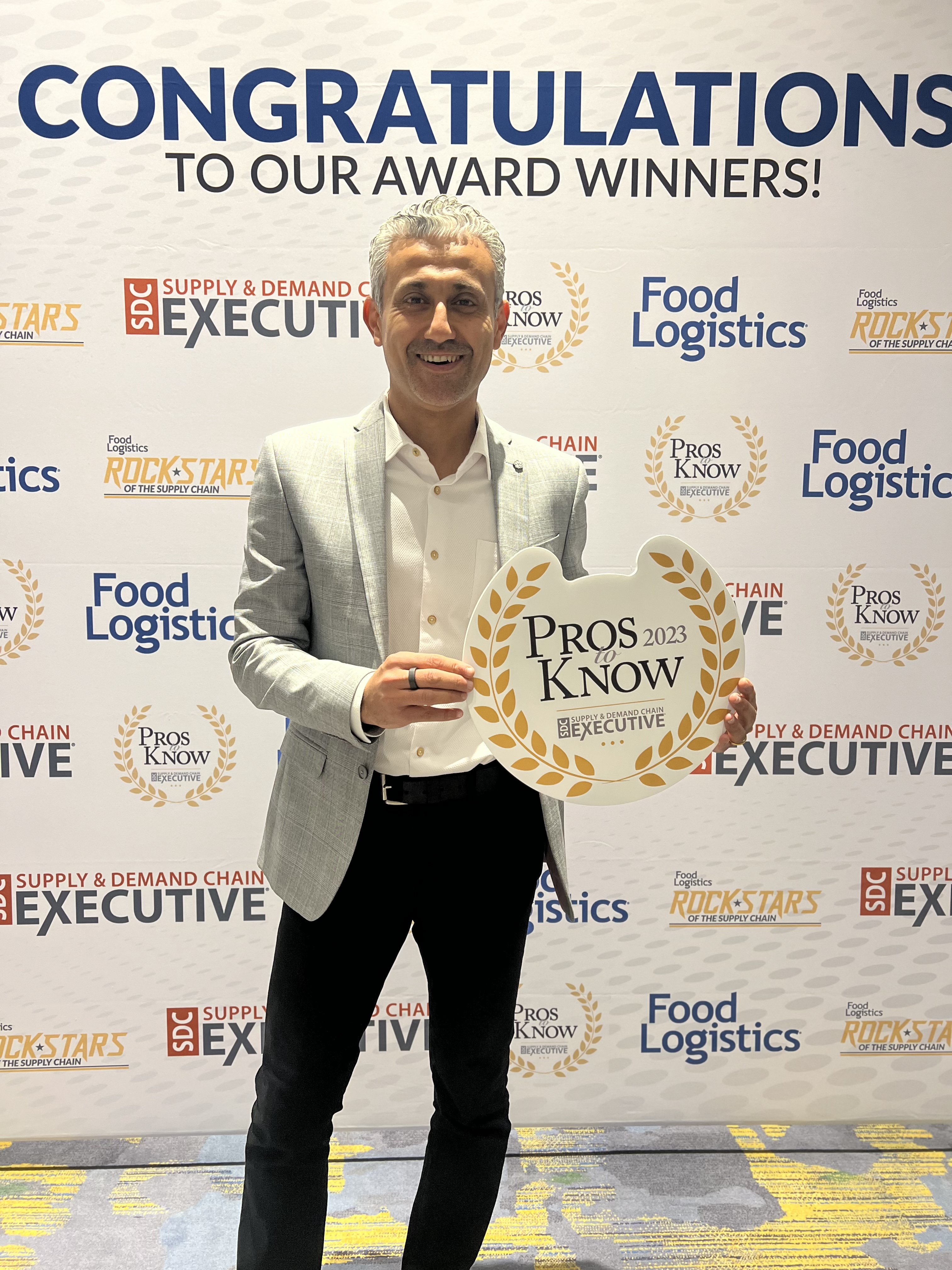 Specright CTO, Ayman Shoukry, accepts Pros to Know award at Supply & Demand Chain Executive ProMat 2023 in Chicago.